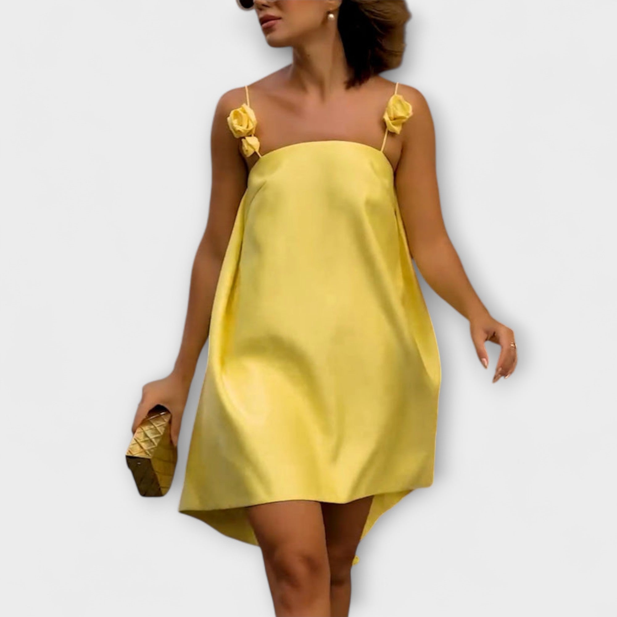 Jordan - Stilren blommig mönstrad lös miniklänning med band