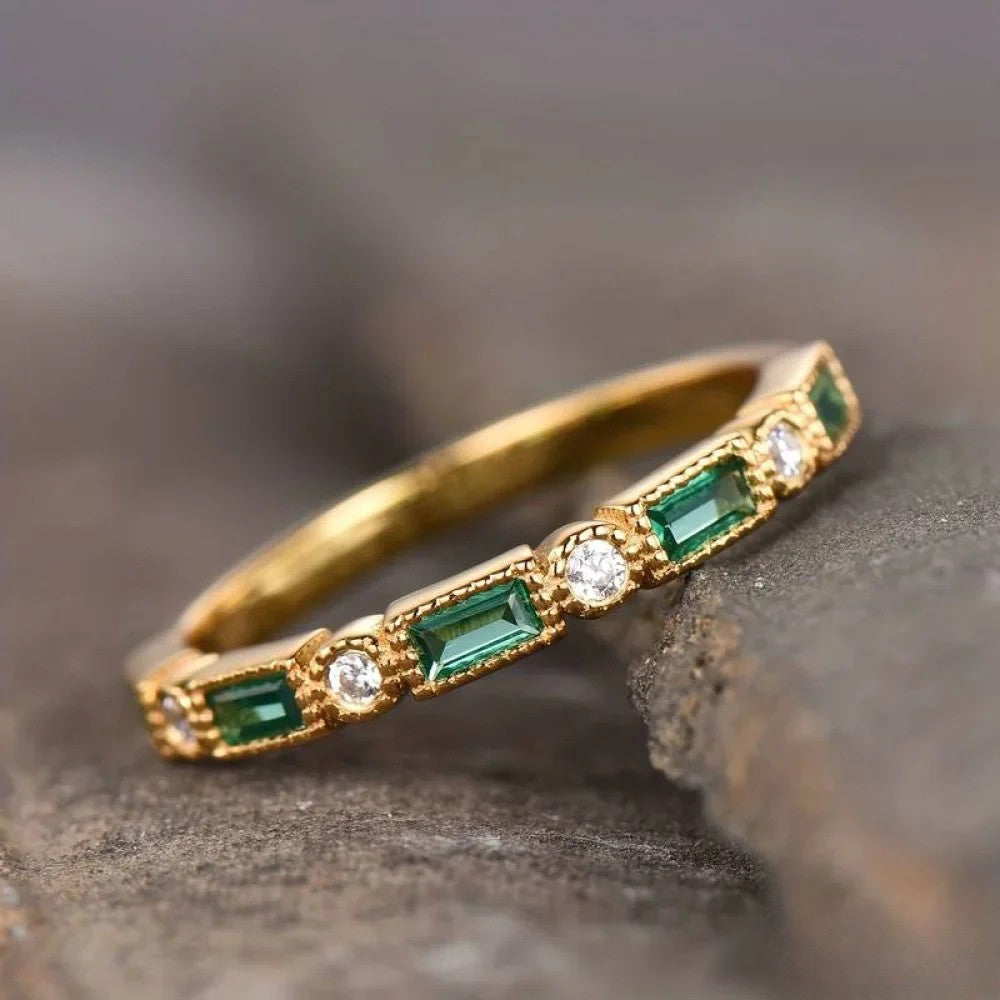 Anello in oro con zircone verde retrò e intarsio